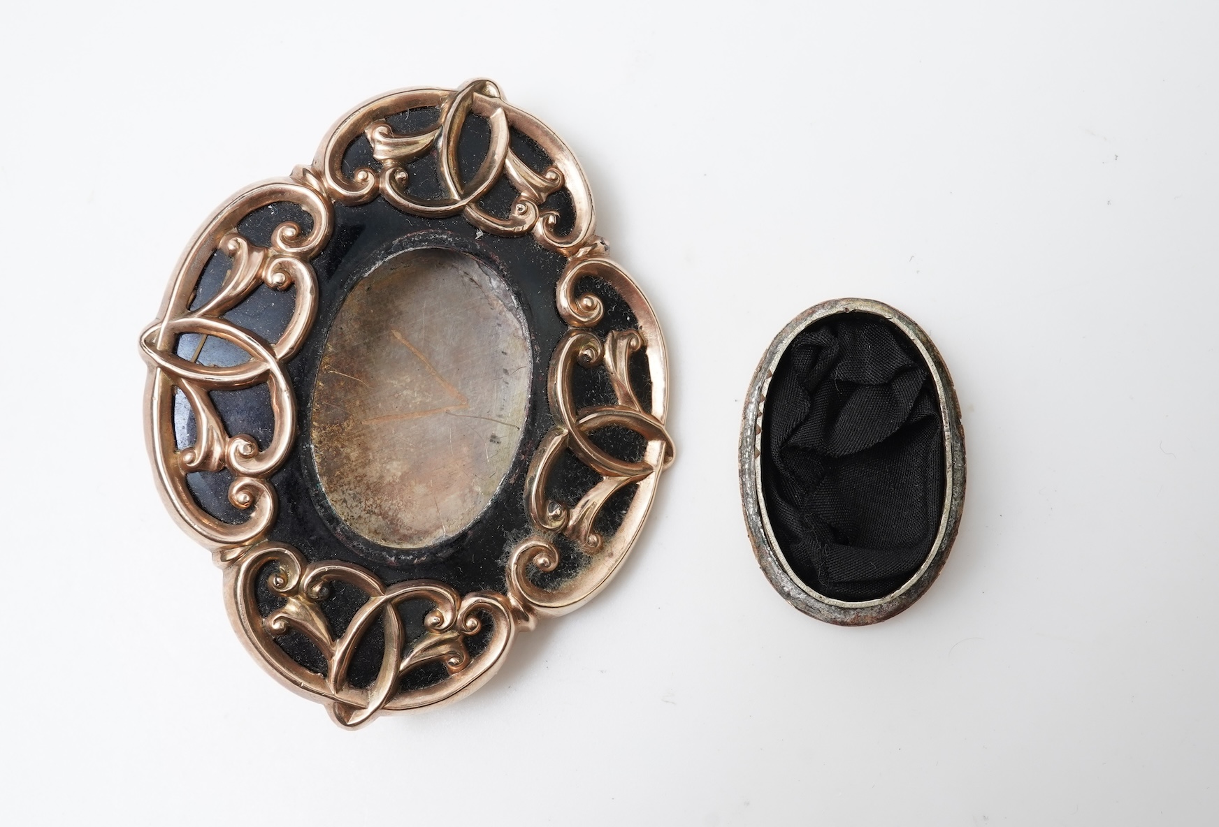 A Victorian rolled gold and enamel locket brooch/pendant, late 19th century